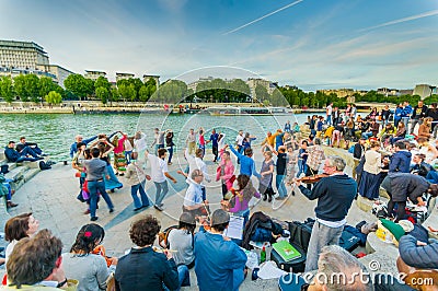 People dancing to live music in the streets of Paris Editorial Stock Photo