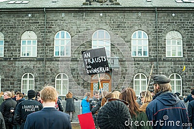 People demonstrating outside the government of Iceland during th Editorial Stock Photo