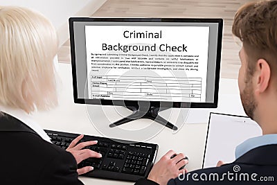 People Doing Criminal Background Check Stock Photo