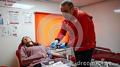 People donate blood to the Red Crescent blood bank in order to help the injured people in the earthquake area in Turkey Editorial Stock Photo