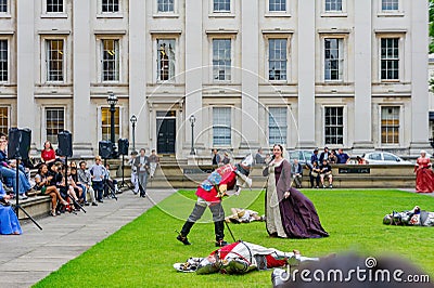 People dress up in medieval clothes doing performance in front of The British Museum Editorial Stock Photo
