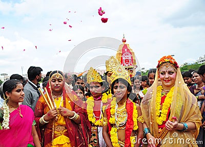 People dressed as Lord Krishna and Goddess Radha in India Editorial Stock Photo