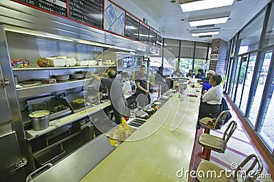 People eating breakfast at diner counter at old Waffle Shop in Washington DC Editorial Stock Photo