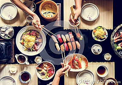 People eating Japanese food together Stock Photo