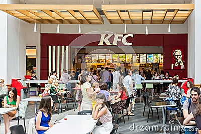 People Eating At Local Kentucky Fried Chicken Restaurant Editorial Stock Photo