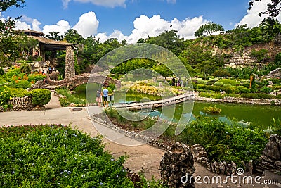 People enjoy the beautiful view in San Antonio Japanese Tea Garden Editorial Stock Photo