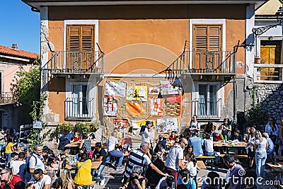People enjoy the chestnut festival, autumn in Ospedaletto d'Alpinolo near Avellino, Italy Editorial Stock Photo