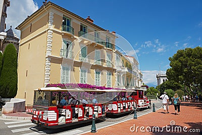 People enjoy excursion with the sightseeing train in Monaco, Monaco. Editorial Stock Photo