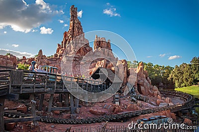 People enjoying Big Thunder Mountain Railroad at Magic Kigndom 2. Editorial Stock Photo