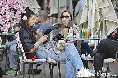 People enjoying the nice warm weather and open cafes in Sofia Editorial Stock Photo