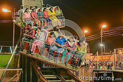 People enjoying Roller coster ride at Howrah, West Bengal, India Editorial Stock Photo