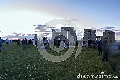 People enjoying summer Solstice at Stonehenge England. Editorial Stock Photo