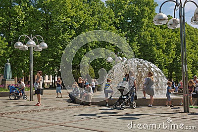 People enjoying sunny summer day at park in Oslo, Norway Editorial Stock Photo