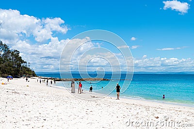 People enjoying the sunny weather at the tranquil, white-sand Murrays Beach in Jervis Bay, Booderee National Park, NSW, Australia Editorial Stock Photo