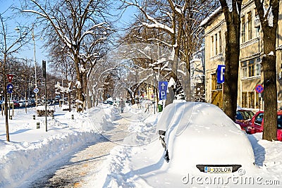 People Enjoying Sunny Winter Day Following A Strong Snow Storm In Downtown Bucharest City Editorial Stock Photo