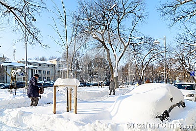 People Enjoying Sunny Winter Day Following A Strong Snow Storm In Downtown Bucharest City Editorial Stock Photo