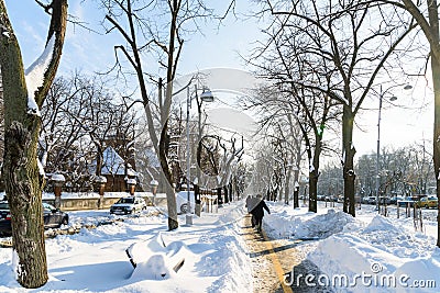 People Enjoying Sunny Winter Day Following A Strong Snow Storm In Downtown Bucharest City Editorial Stock Photo