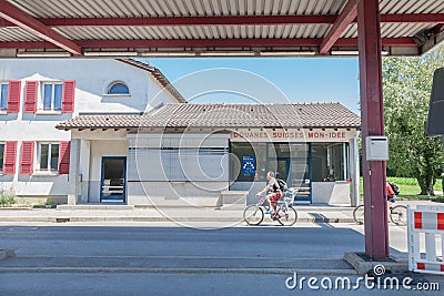 People entering Switzerland from France in Mon Idee, an abandoned border crossing from the Swiss Customs Editorial Stock Photo