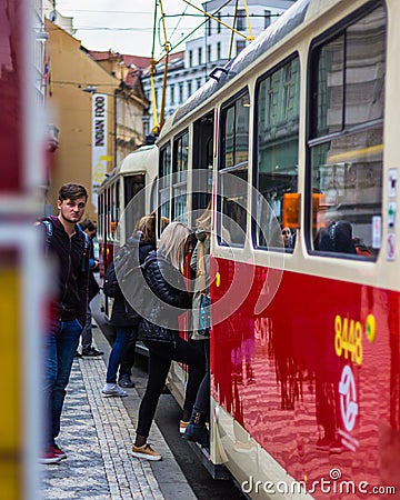 People entering tram Editorial Stock Photo