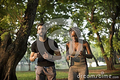 People exercising in a park Stock Photo