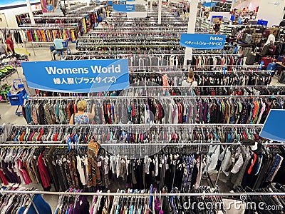 People explore aisle of clothes shopping in Ross store with sign Editorial Stock Photo