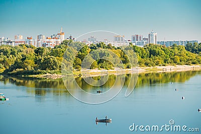 People Fishing From Rowing Boat In Sozh River In Gomel, Belarus. Editorial Stock Photo