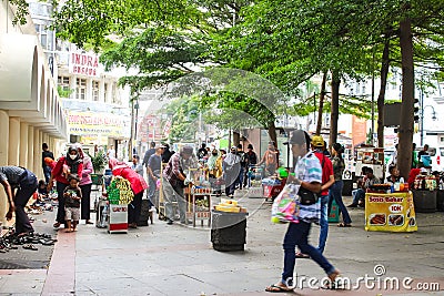 People and Food Vendors are visiting the Great Mosque of Bandung Editorial Stock Photo