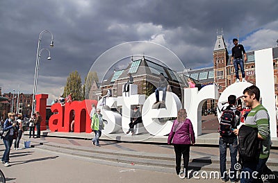 People in front of the Rijksmuseum and popular statue 'I Amsterd Editorial Stock Photo