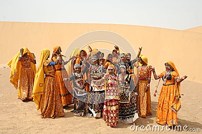 People in getup at the Desert Editorial Stock Photo