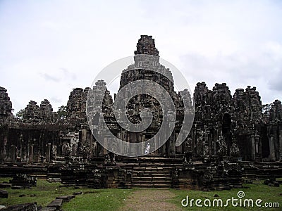 People going down stairs in ancient city Angkor Thom, Cambodia. Editorial Stock Photo