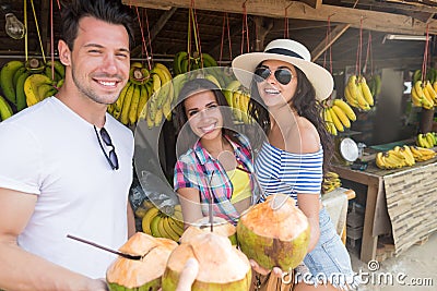 People Group Drink Coconut Cocktail Asian Fruits Street Market Buying Fresh Food, Young Friends Tourists Exotic Vacation Stock Photo