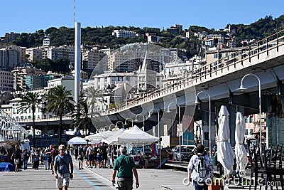 People on Harbour Front, Porto Antico, Genoa, Italy Editorial Stock Photo