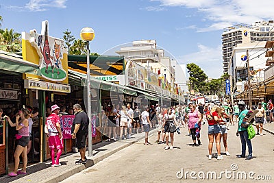 People have party at the Schinkenstrasse, engl: Ham Street at Ballermann - engl: fun man in Palma Editorial Stock Photo