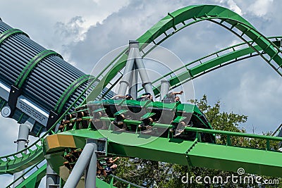 People having fun amazing The Incredible Hulk rollercoaster , during vacation summer at Island of Adventure 1 Editorial Stock Photo