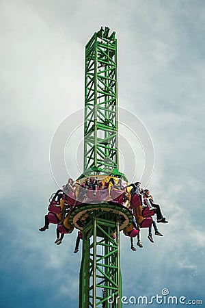 People having fun on amusement park Editorial Stock Photo