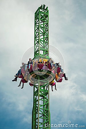 People having fun on amusement park Editorial Stock Photo