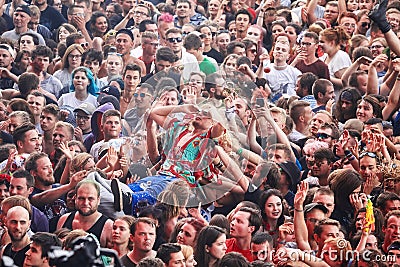 People having fun at a concert on the 23rd Woodstock Festival Poland. Editorial Stock Photo