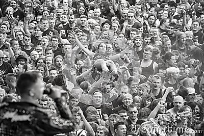 People having fun at a concert during the 23rd Woodstock Festival Poland. Editorial Stock Photo