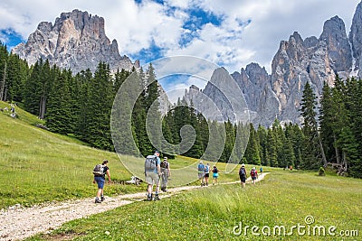 People hiking in the Dolomites Alps Editorial Stock Photo