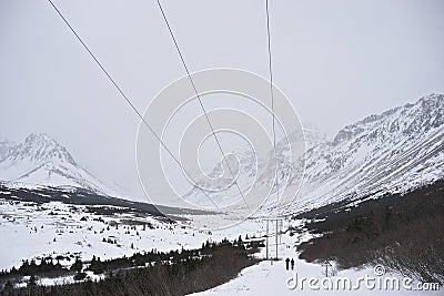 People hiking in Power Line Pass Anchorage Alaska Stock Photo