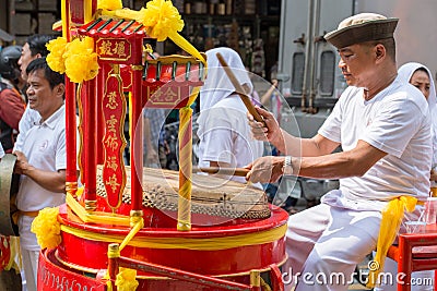 People hit Chinese traditional drum in Chinese dragon dance at Bangkok China Town Editorial Stock Photo