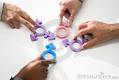 People Holding Different Type Of Gender Sign Stock Photo