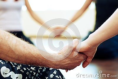 People holding each other's hand Stock Photo