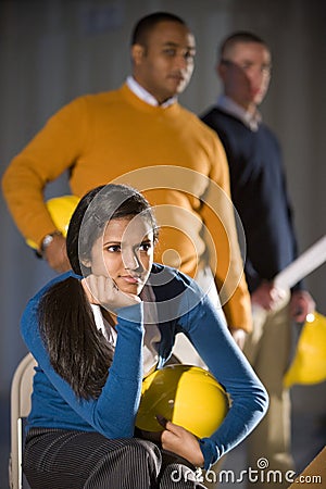 People holding hard hats Stock Photo