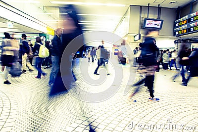 People hurry at Shinagawa Station Editorial Stock Photo