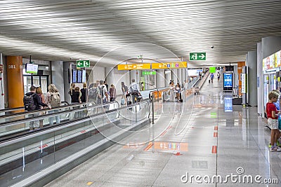 People hurry to the gate at Palma international airport, Spain Editorial Stock Photo