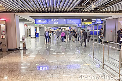 People hurry to their gate in Terminal 1 of rankfurt international airport Editorial Stock Photo