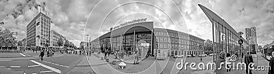 people hurry to train station with its modern glass facade construction in Munster, Germany Editorial Stock Photo