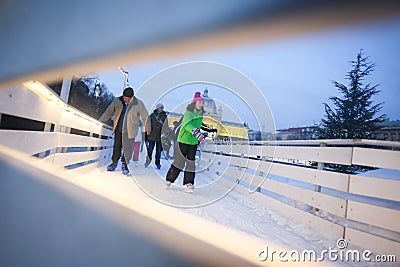 People ice skating in rink Editorial Stock Photo