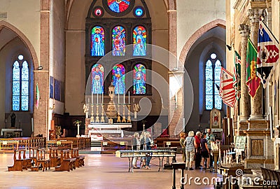 People inside the gothic style church, 15th century Basilica of San Domenico Editorial Stock Photo